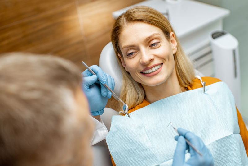 woman at the dentist getting a checkup